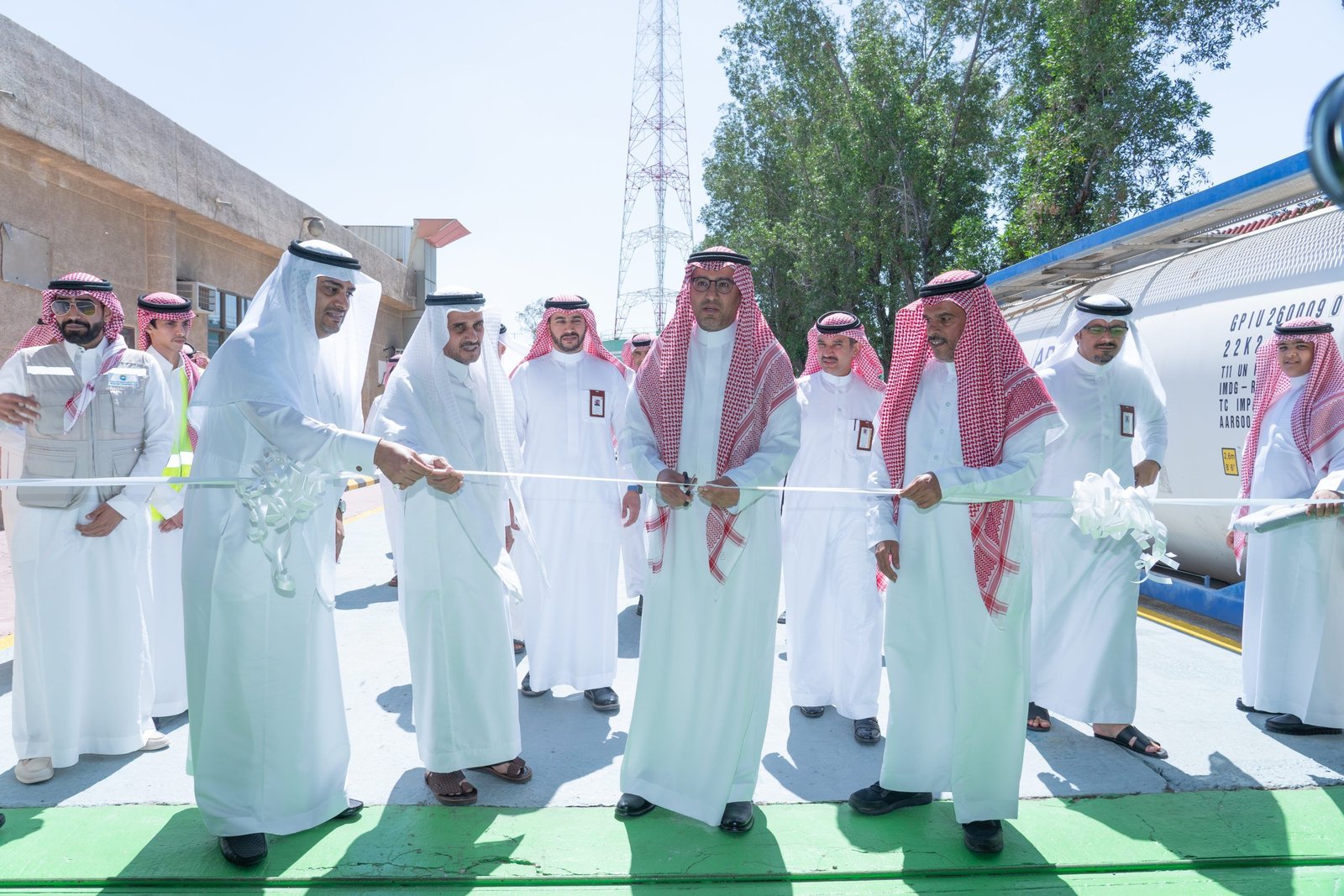 Opening day at The Biofuel Company, cutting a ribbon